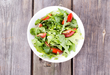 Salad arugula and cherry tomato