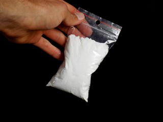 Men holding bag with cocaine drug powder, men selling drugs junkie