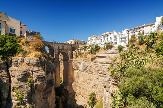 Puente Nuevo and buildings on the cliffside of El Tajo Gorge in Ronda, Malaga province, Spain.