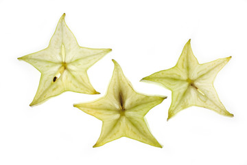 Obraz premium Light through a star fruit isolated on white background.