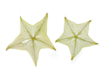 Fototapeta premium Light through a star fruit isolated on white background.