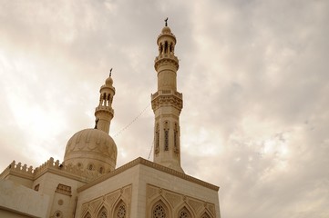 Tower minaret against a bright  sky, Egypt.photo toned