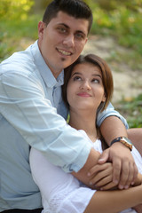 Fototapeta premium Young couple in love hugging