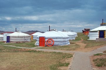 white Mongolian yurts in the Gobi Desert