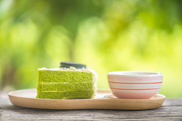 Fototapeta na wymiar Matcha Green tea cake, tea and cake