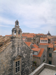 Fototapeta na wymiar dubrovnik, Croatia, 06/06/2016 Dubrovnik old town croatia, roof top view of churches and houses