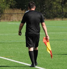 Obraz premium l'arbitre au football
