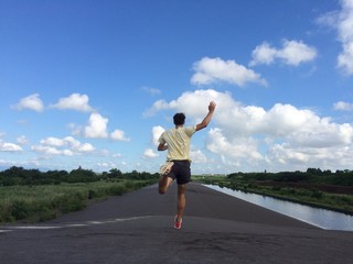 Man running away fast downhill