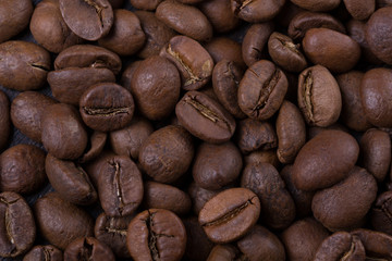 Naklejka premium coffee beans close-up. background