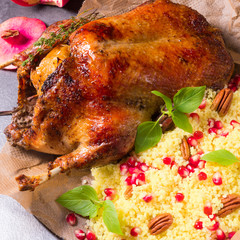 Duck with millet and pomegranate