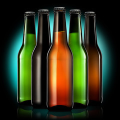 Set of beer bottles isolated on black background