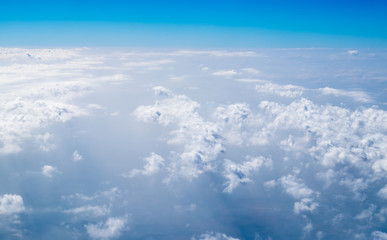 Naklejka na ściany i meble Aerial view of cloud and sky from airplane,Traveling concept