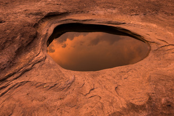 Sampanbok (3000 Hole) with sunset in the background, The Amazing  in Mekong River, Ubon Ratchathani, Thailand