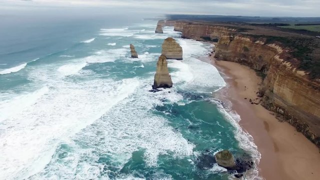 Backward flight over the 12 Apostles. Great Ocean Road, Victoria, Australia