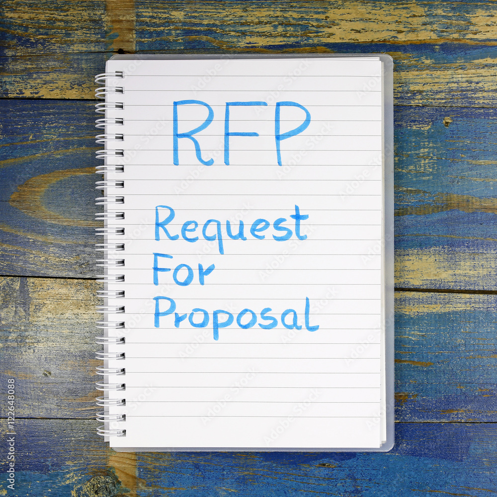 Poster rfp- request for proposal written in notebook on wooden background