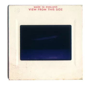 London, England, 06/06/2016 Vintage Slide film mount isolated on a white background
