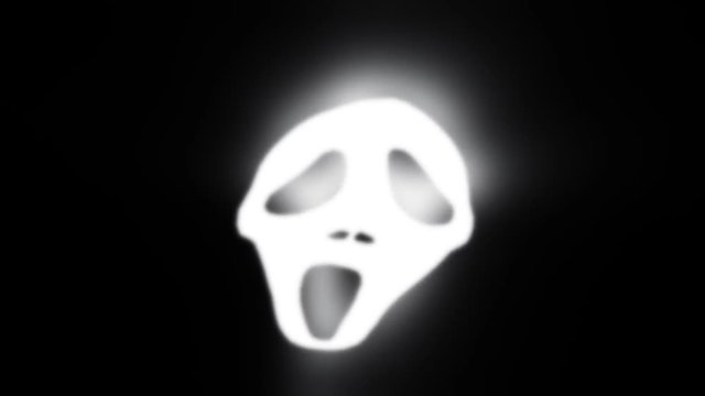A 15 second loop of a scary,distorted floating face over a black background. HD 1080p.