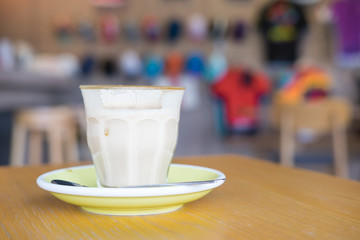 Hot Latte Coffee on wooden table, copy  space