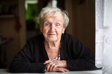 Portrait of an elderly woman close-up.