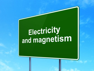 Science concept: Electricity And Magnetism on road sign background