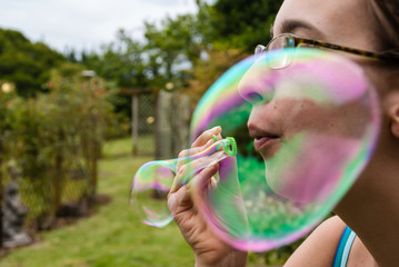 Amy blowing bubbles