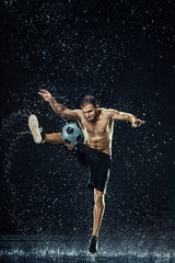Water drops around football player