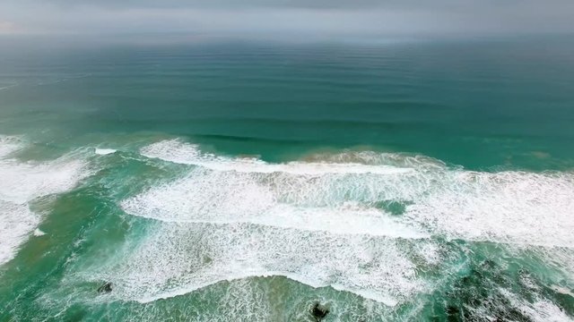 Static aerial view of crushing ocean waves. Great Ocean Road, Victoria, Australia