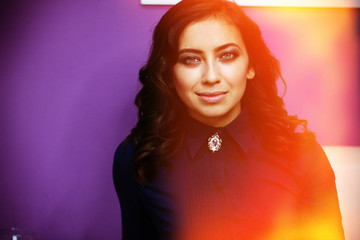 portrait of a beautiful young girl, purple background