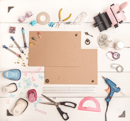 top view of the table with tools for scrapbooking