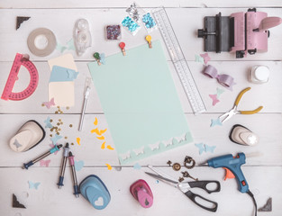 top view of the table with tools for scrapbooking - obrazy, fototapety, plakaty