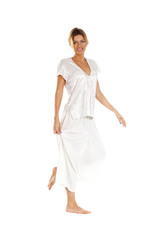 Young beautiful blonde woman in white dress