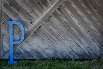 Letter P on Barn Wood Wall