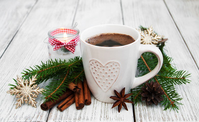 Obraz na płótnie Canvas Cup of coffee and christmas decoration