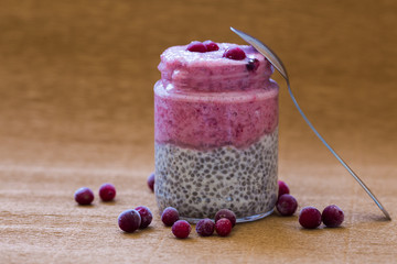 Berry Smoothie and Chia seed on beige background, selective focus