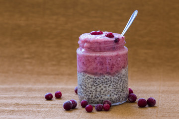 Berry Smoothie and Chia seed on beige background, selective focus
