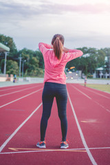 Beautiful woman fitness sunrise jogging workout wellness concept.