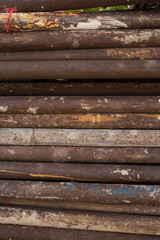 old rusty grungy metal or steel rods or bars in construction structure