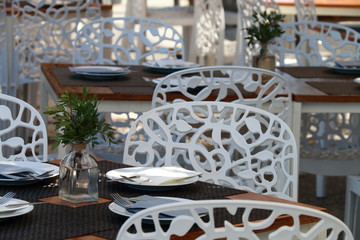 Table with plates and cutlery and decorated
