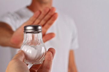 Man refusing salt. Health care concept, hypertension prevention