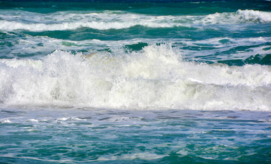 Naklejka na ściany i meble Blue and Green White Water Ocean Waves Breaking At The Beach