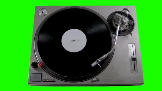 An overhead shot of a turntable with a keyable background.