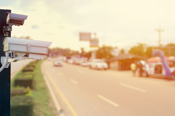 Closeup of traffic security camera surveillance CCTV on the road background