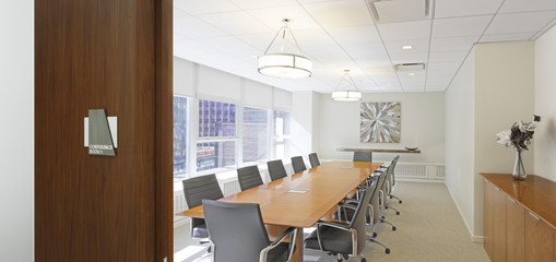 Table and chairs in empty conference room