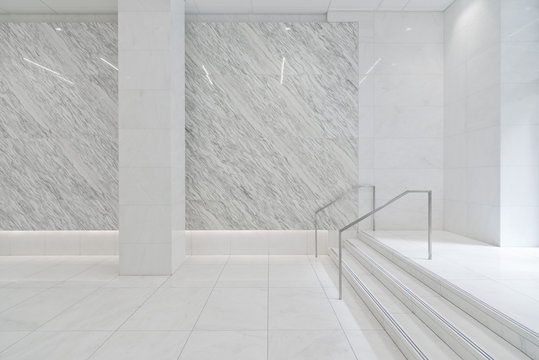 Stairs in tiled marble lobby