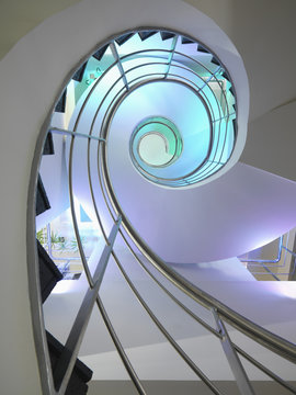 Low angle view of illuminated spiral staircase