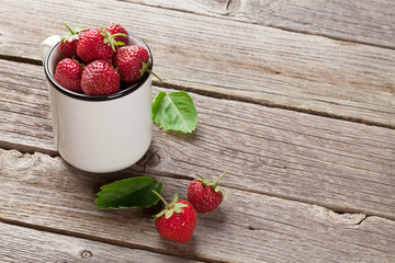 Fresh garden strawberry in cup