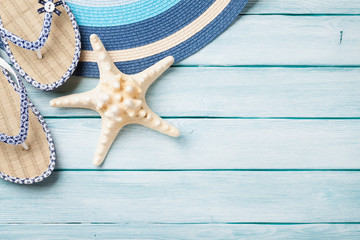 Beach accessories on wooden background