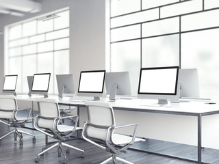 Fototapeta na wymiar Bright office with computers. 3d rendering
