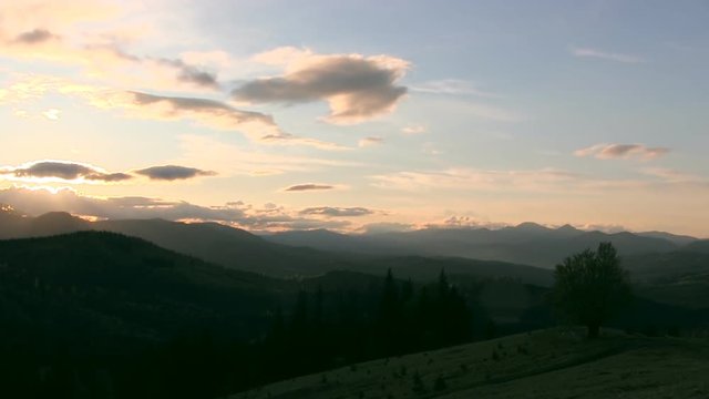 Sunset in the mountains. Beautiful landscape timelapse.