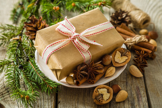 Christmas preasent nuts cinnamon ribbon